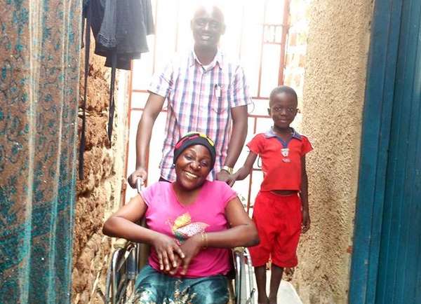 Sarah Namusoke gets a wheelchair